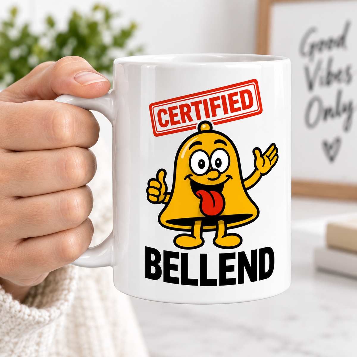 A hand holding a Certified Bellend funny ceramic mug with cheeky character design