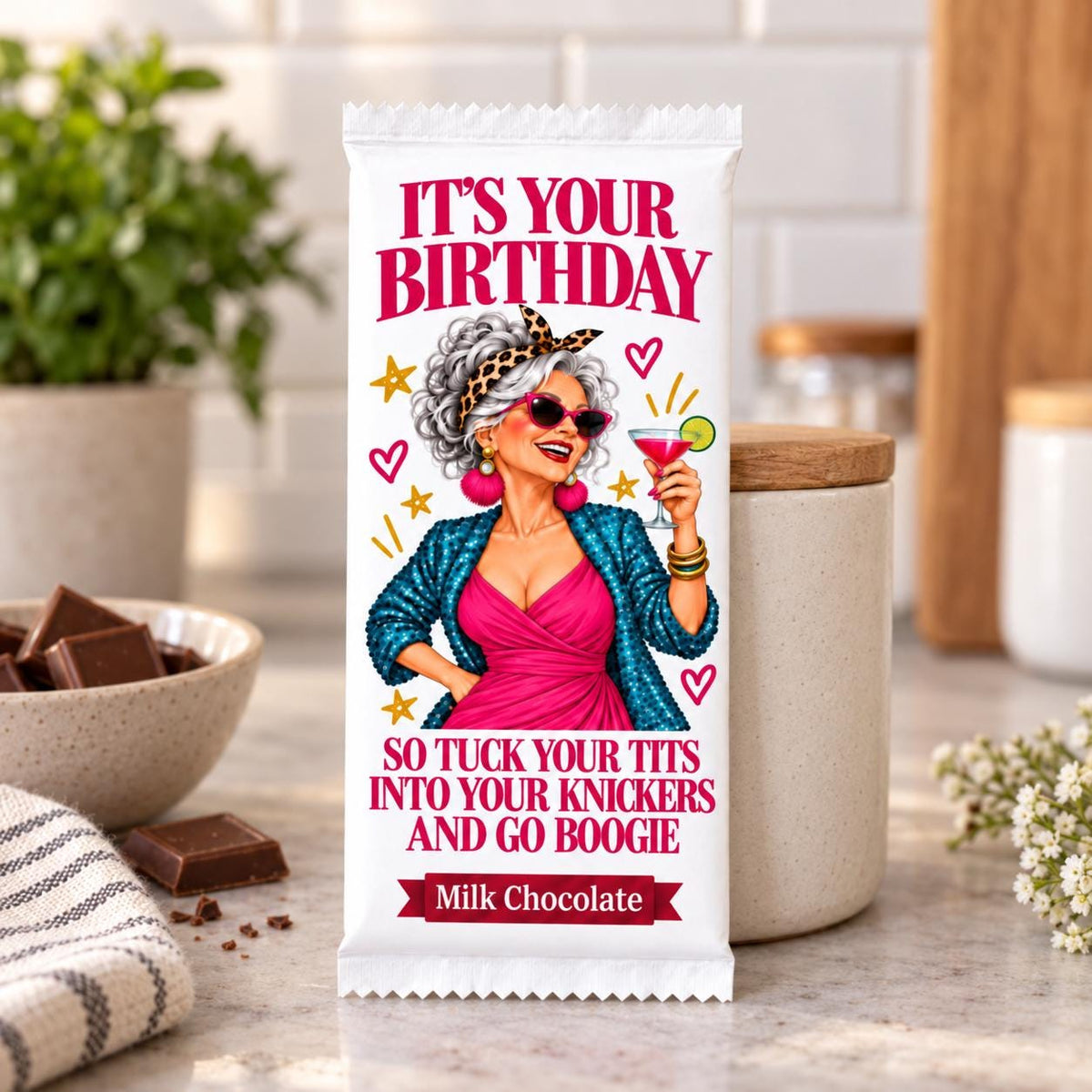 Funny 50th 60th Birthday Gift for Her, Rude Milestone Chocolate Bar on a kitchen worktop with FUNNY SLOGAN text.  IT'S YOUR BIRTHDAY GO BOOGIE