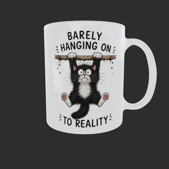 Funny Cat Mug Gift Barely Hanging On To Reality.  Present for Cat Lover Birthday Christmas. Cheeky Office/Work Mug